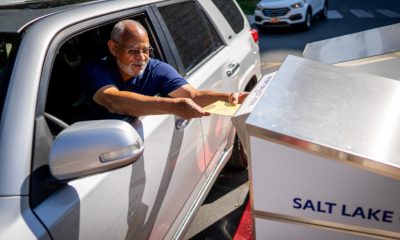 Man submits ballot at Salt Lake drop box