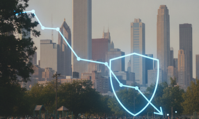 A city skyline with a downward trend line overlay, symbolizing the decline in homicide rates acro — homicide rates decline