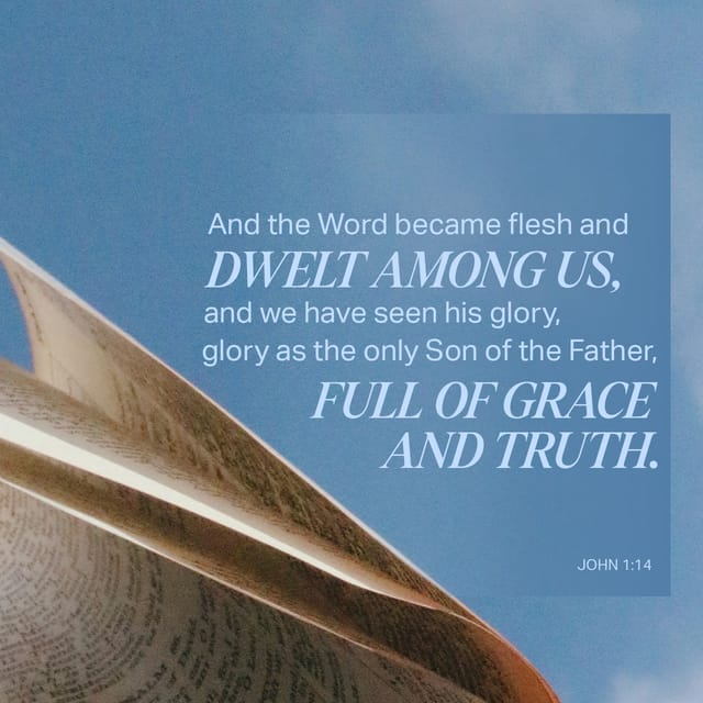 Open Bible pages with the verse John 1:14 highlighted, emphasizing the incarnation of Jesus Christ.