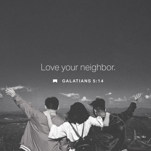 Three people with their backs to the camera, embracing and looking at a scenic landscape, with th — Galatians 5 14 meaning