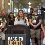 A group of supporters wearing shirts advocating for personal liberty and ending the abortion ban gat — Idaho Proposition 1