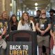 A group of supporters wearing shirts advocating for personal liberty and ending the abortion ban gat — Idaho Proposition 1