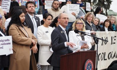 A group of lawmakers and supporters at a press conference advocating for state bills — state bills immigration enforcement