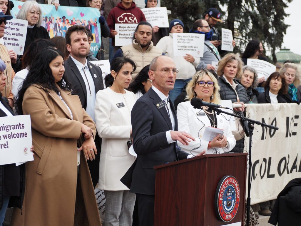 A group of lawmakers and supporters at a press conference advocating for state bills — state bills immigration enforcement