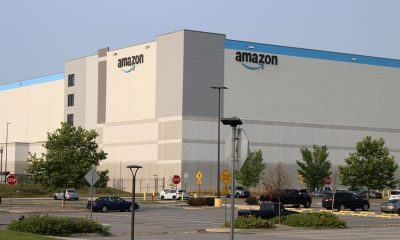 Amazon warehouse exterior with clear sky and parking lot, highlighting the company's logi — FTC Amazon advertising lawsuit
