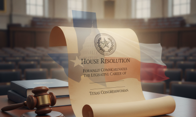 A scroll with a House Resolution commemorating Sheila Jackson Lee, placed on a wooden desk — Sheila Jackson Lee resolution