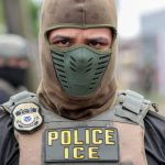 An ICE officer in tactical gear with a mask and police insignia, focused expre — immigration enforcement houses of worship
