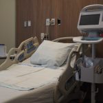Empty hospital bed with medical equipment in a healthcare facility, hi — Drug-Resistant Fungal Infection Spreads Across 28