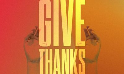 Hands raised in gratitude with the text 'I will give thanks to the Lord' in vibrant colors, reflecting Psalms 9:1 meaning.
