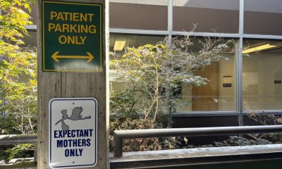 Signage indicating patient parking and expectant mothers only at a medical fac — High Risk Pregnancy Doctors Abortion Bans