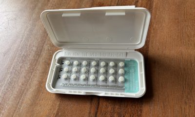 A pack of birth control pills opened on a wooden surface, showing the pills arran — Pennsylvania Title X lawsuit dismissed