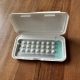 A pack of birth control pills opened on a wooden surface, showing the pills arran — Pennsylvania Title X lawsuit dismissed