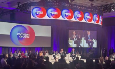 Panel discussion featuring governors on stage addressing federal overreach, with a co — governors oppose federal overreach