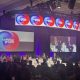 Panel discussion featuring governors on stage addressing federal overreach, with a co — governors oppose federal overreach