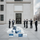 Group of people in business attire discussing outside a government building, s — Sheriff Adrian Butch Anderson Post Office
