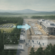 Rendering of the new Fort Bragg veterans home site, showing construction progress and surrounding landscape.