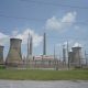 Coal and natural gas power plant with cooling towers and smokestacks under a cloudy — Trump EPA power plant emissions rule