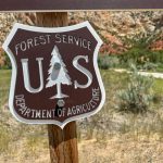 Sign for the U.S. Forest Service Department of Agriculture in a natural — Forest Service Headquarters Move to Utah Blocked