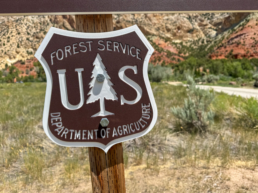 Sign for the U.S. Forest Service Department of Agriculture in a natural — Forest Service Headquarters Move to Utah Blocked
