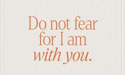 Isaiah 41 10 meaning verse graphic with orange text reading “Do not fear, for I am with you” on a cream background.