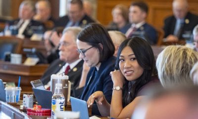 Young lawmakers in Kansas, including Angel Roeser, engage in a legislative session, highlighting Gen Z's involvement in po…