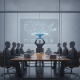 A business meeting with faceless figures around a table, and a holographic display — Reshoring American Manufacturing Act