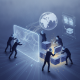 Illustration of figures working together on digital data blocks, symbolizing collaboration on the HR 10757 UN funding bill.