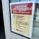 A sign warning about the contagious nature of measles, instructing people to wear masks an — Pennsylvania Measles Outbreak